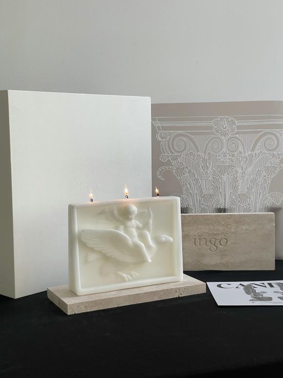 ingo | "Cupid on the Dolphin" Bas-Relief Sculpture Candle – Heavyweight Marble Base Scented Art Piece