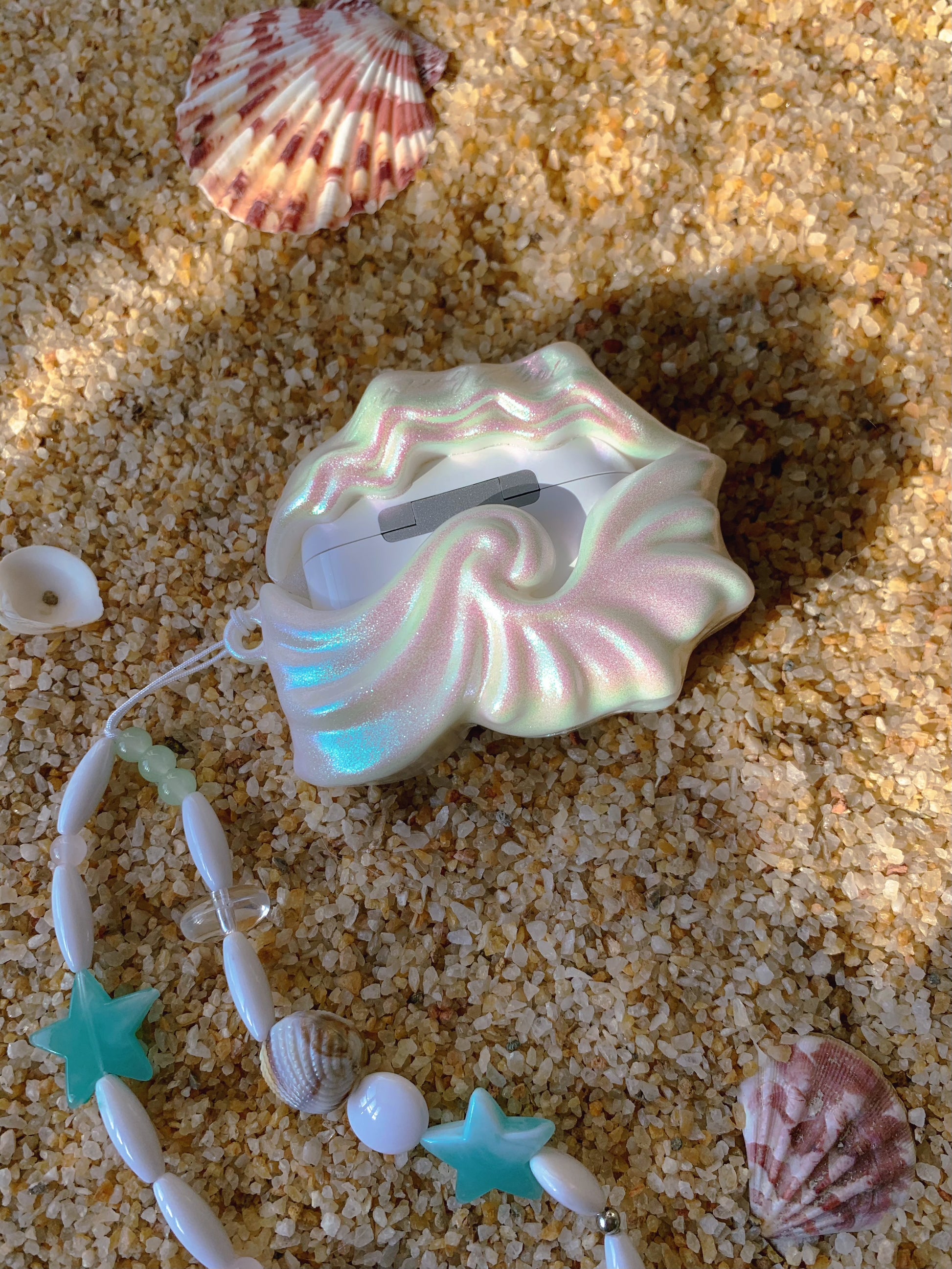 "Starry Sea"– Iridescent Pearly Seashell AirPods Case