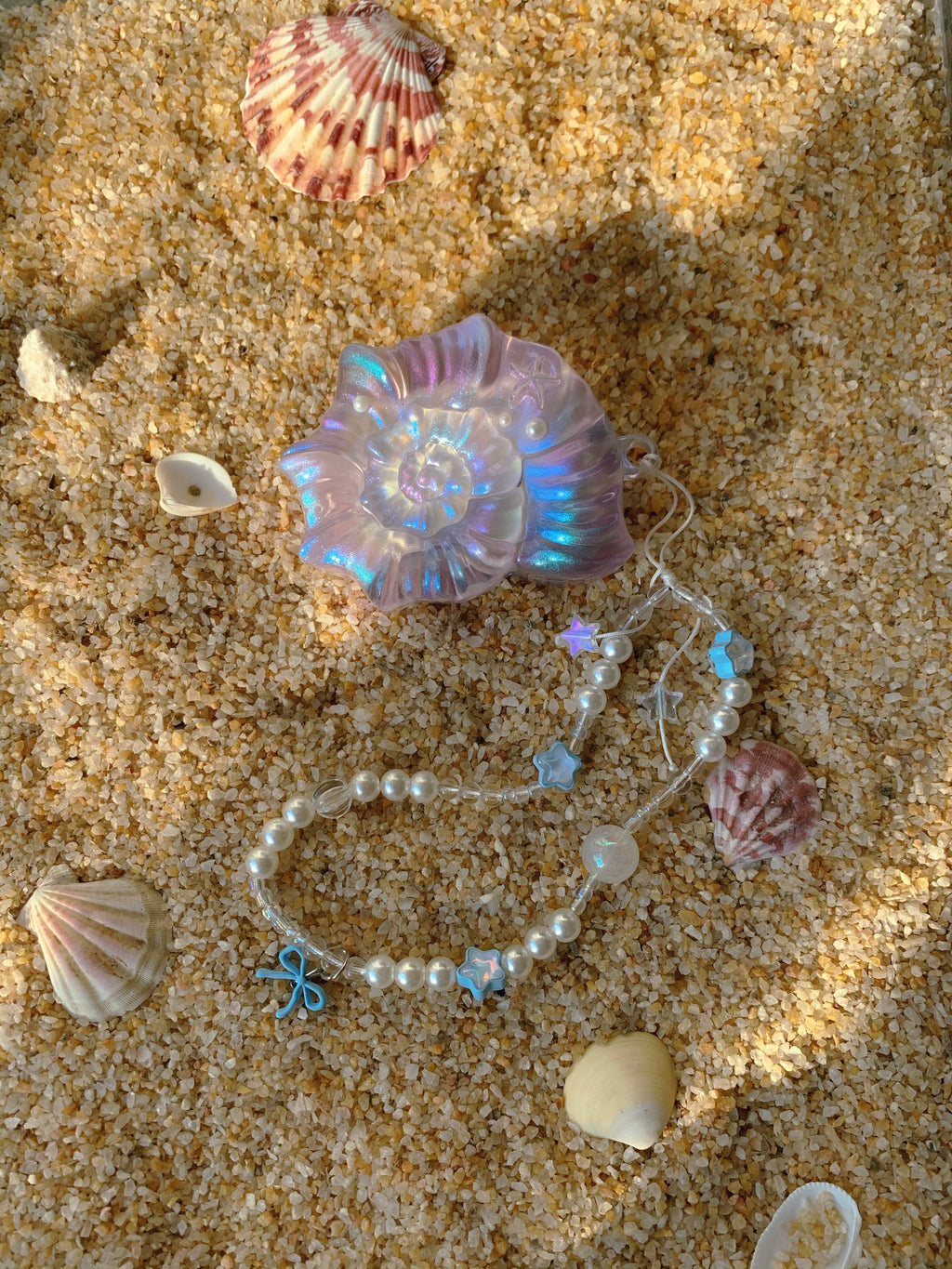 "Echoes of the Sea" – Iridescent Pearly Seashell AirPods Case