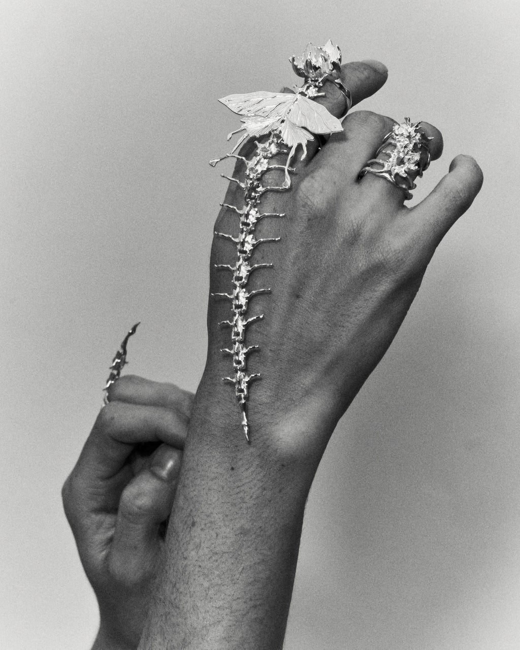 Iris & Moth Spine Ring — Articulated Sterling Silver