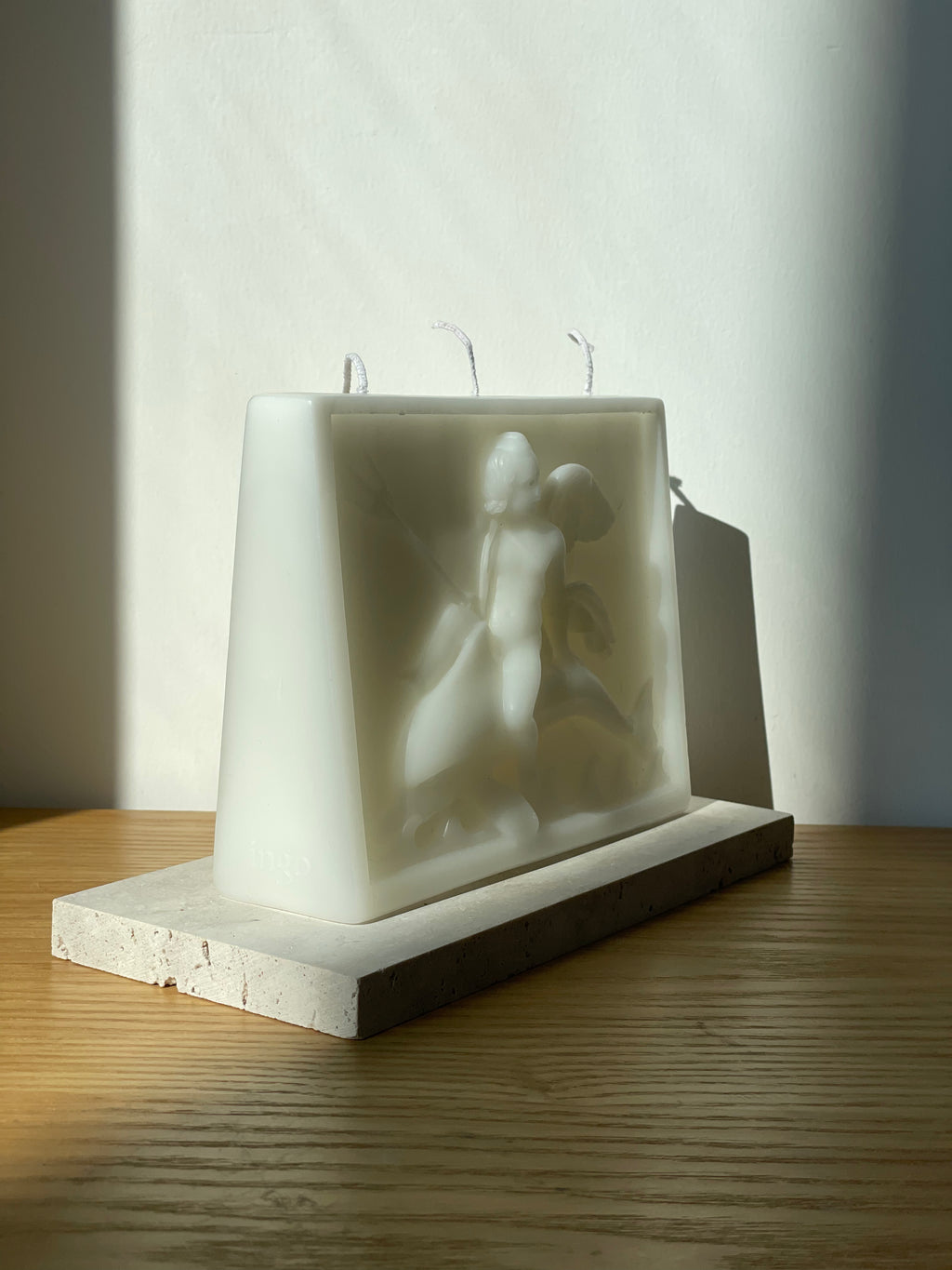 ingo | "Cupid on the Dolphin" Bas-Relief Sculpture Candle – Heavyweight Marble Base Scented Art Piece