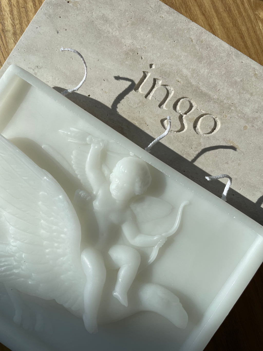 ingo | "Cupid on the Dolphin" Bas-Relief Sculpture Candle – Heavyweight Marble Base Scented Art Piece