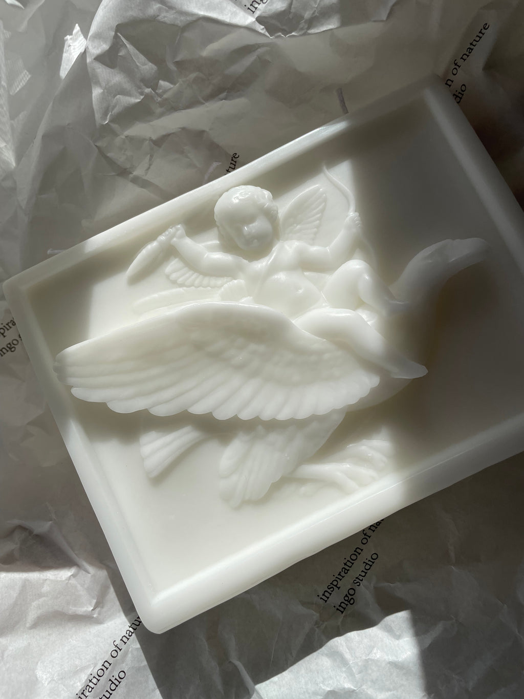 ingo | "Cupid on the Dolphin" Bas-Relief Sculpture Candle – Heavyweight Marble Base Scented Art Piece