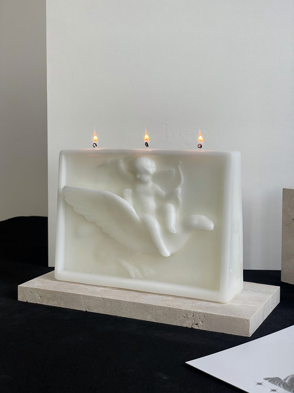ingo | "Cupid on the Dolphin" Bas-Relief Sculpture Candle – Heavyweight Marble Base Scented Art Piece