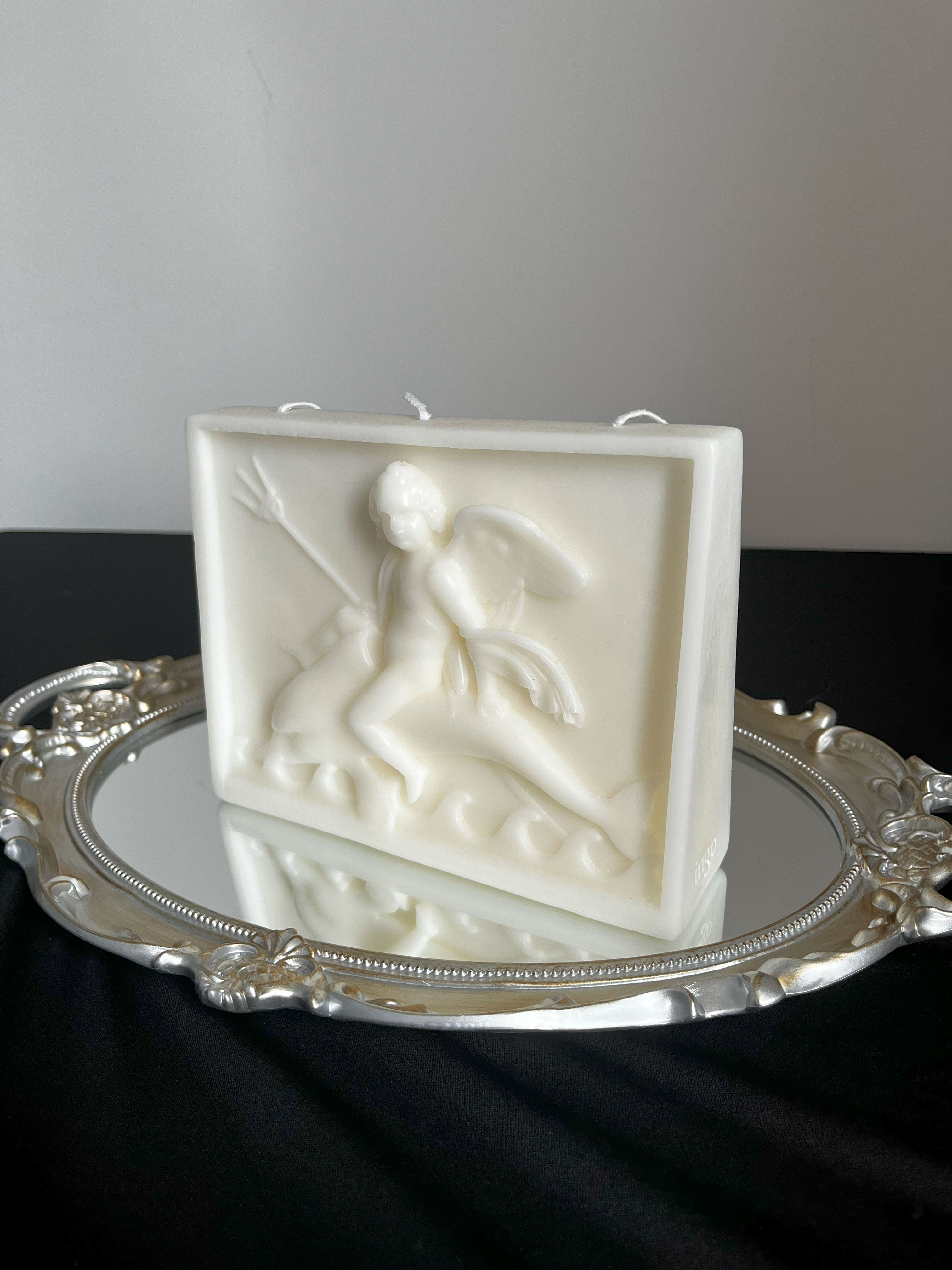 ingo | "Cupid on the Dolphin" Bas-Relief Sculpture Candle – Heavyweight Marble Base Scented Art Piece